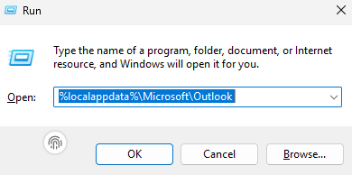 Type %localappdata%\Microsoft\Outlook