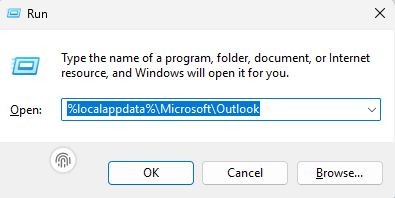 Type %localappdata%\Microsoft\Outlook