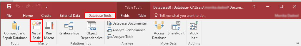 Click Database Tools and then click Visual Basic